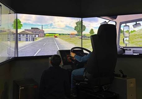Truck simulator with children at DASA, German Occupational Safety Exhibition, Dortmund, Ruhr area,