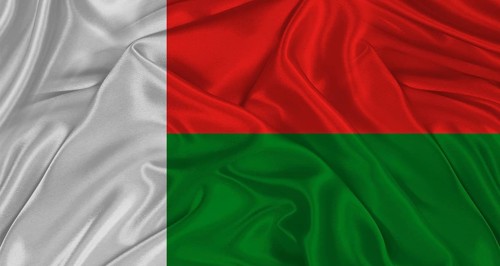 Malagasy flag with fabric texture. Realistic flag of Madagascar waving, National flag