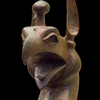 Bronze griffin protome, bronze sculptural depiction of a mythical being with stylized head, Olympia