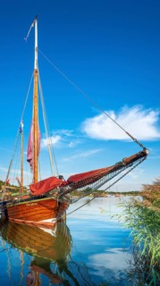 Traditional wooden sailboat in the harbor on the ferry of Moritzdorf, OT of Sellin, Mönchgut