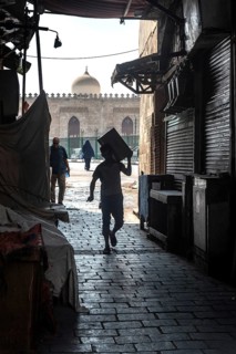 Cairo, Egypt. July 1st 2024 Workers in the narrow cobbled alley ways of Islamic Cairo near the