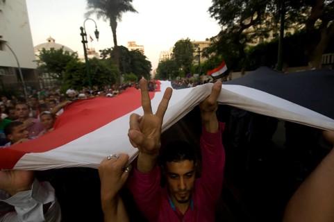 Cairo, Egypt. July 12th 2011 Egyptian anti government protestor showing the victory sign near