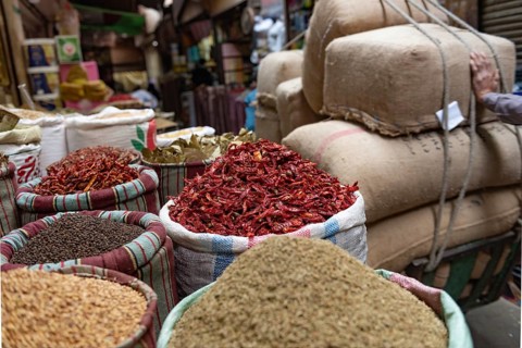 A sack of dried red chilli peppers being sold in the spice market close to Khan El Khalili Bazaar