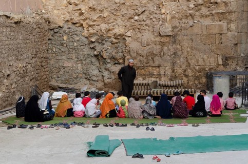 Cairo, Egypt. 21st October 2011 An open air school class and Muslim teacher giving lessons to