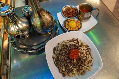 Koshary, kushari or koshari the most popular culinary dish in Egypt, a mix of pasta, rice, lentils,