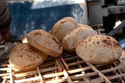 Freshly oven baked traditional Baladi flat bread, similar to pitta bread is a staple of Egyptian