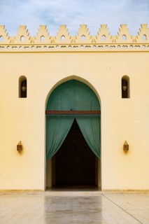 Arched doorway to the prayer hall of historic Mosque of al-Hakim, also known as Al-Anwar, named