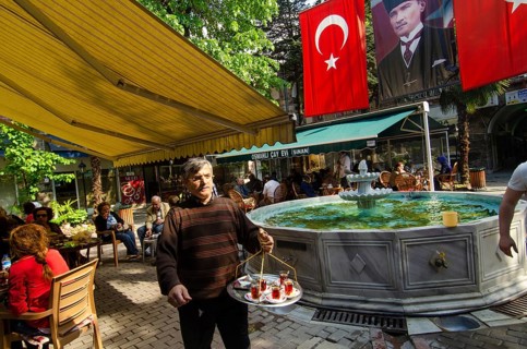 Bursa, Turkey. April 21st 2014 Turkish tea being served in an outdoor cafe, Bursa City, Turkey