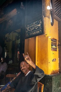 Cairo, Egypt. July 23rd 2011 An Egyptian man enjoying a shisha water pipe in the famous El Fishawy