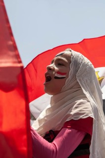 Cairo, Egypt. July 22nd 2011 Young Egyptian girl chanting slogans at an anti-government protest in
