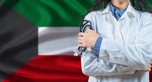 Healthcare professional with Kuwait flag background. Professional doctor holding stethoscope on