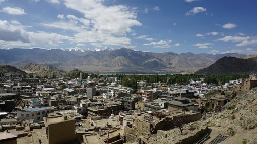 Panoramic view of Leh city with surrounding mountains and slightly cloudy sky, Ladakh, North India,