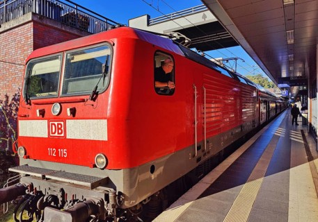 Locomotive with commuter train on the railway track, Gesundbrunnen station, Berlin, Germany
