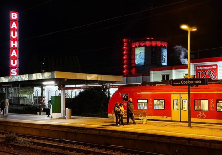 Local train at Oberbamen station with gas boiler at night, Wuppertal, North-Rhine Westphalia,