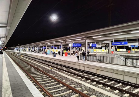 Empty platform at night with full moon, central railway station, Dortmund, Ruhr area, North