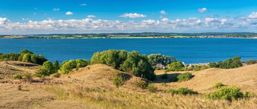 Hilly landscape in the Zicker Mountains, including Zicker Alps, view over the lagoon landscape, in