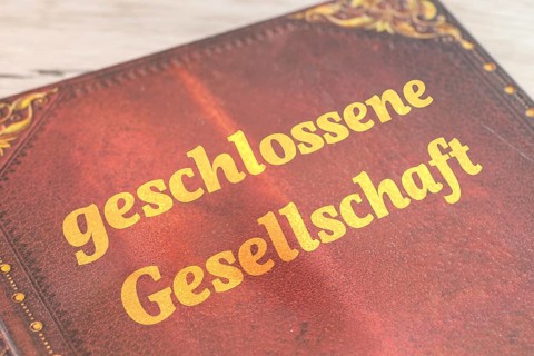 Symbolic menu with (added) text CLOSED SOCIETY