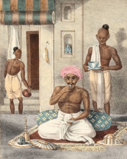 A high-ranking Hindu man eating a shrimp, India, authentic, digitally restored reproduction from a