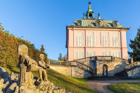 Fassan castle with fountain figures in the foreground, Moritzburg, Saxony, Germany