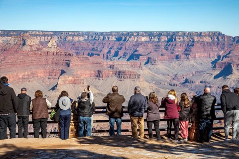 Grand Canyon National Park, Arizona. People lined up on the South Rim to view the Canyon
