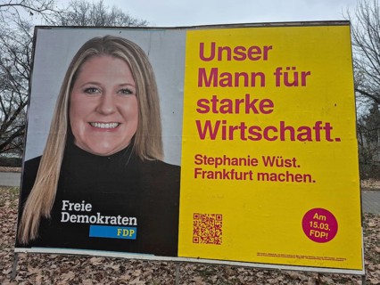 An election poster of the top FDP candidate Stephanie Wüst in Frankfurt am Main advertises with the