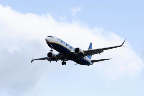 Boeing 737 commercial passenger airliner jet aircraft of Ryanair airways in flight on approach to