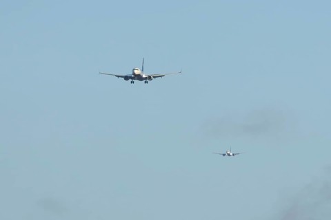 Boeing 737 two commercial passenger airliner jet aircraft of Ryanair airways in flight on approach