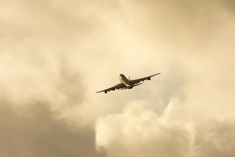 Boeing 747-400 jumbo jet LX-TCV commercial aircraft of Cargolux cargo in flight silhouette at