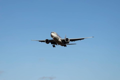 Boeing 777 commercial jet aircraft of Qatar cargo in flight on approach to London Stansted airport,