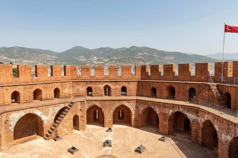Alanya, Turkey. April 7th 2021 The imposing battlements of the Seljuk era Red Tower or Kizi Kule