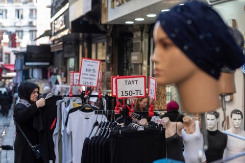 Istanbul, Turkey 7th January 2025. Local shoppers browsing clothes reduced in price in a popular