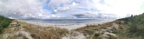 Panoramic view of secluded beach under cloudy sky, Rügen, Baltic Sea