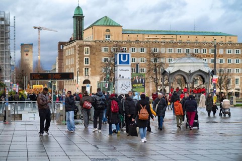 People stroll on Konigsstraße, Schlossplatz, Pavilion, Old Station Tower, Bonatzbau, Subway