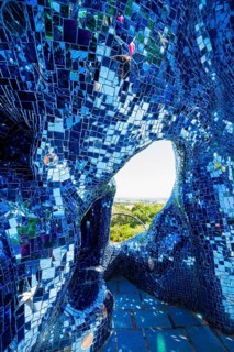 Colourful sculpture made of glass and mirrors, Giardino dei Tarocchi, Garden of Tarot, by Niki de