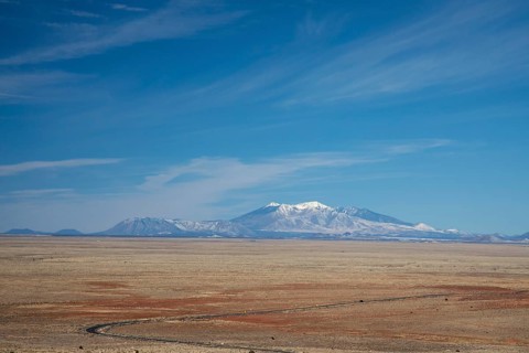 Winslow, Arizona - The San Francisco Peaks, seen from the Meteor Crater, about 45 miles distant.