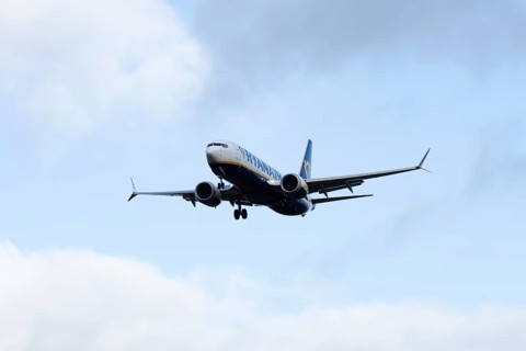 Boeing 737 commercial passenger airliner jet aircraft of Ryanair airways in flight on approach to