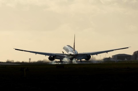 Boeing 777 A7-BFL commercial jet aircraft of Qatar cargo in flight landing on the runway at London