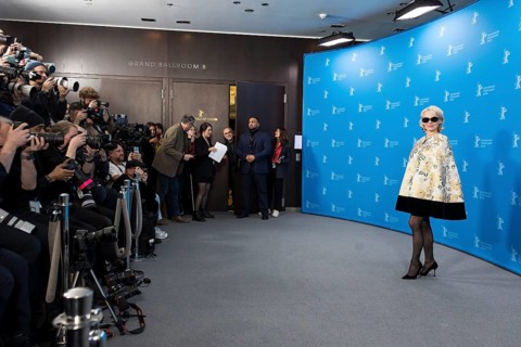 Pamela Anderson (actress) in front of photographers at a photocall for the film Rosebush Pruning at