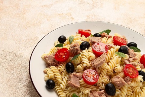 Tuna salad, fusilli pasta, olives and cherry, olive oil, homemade