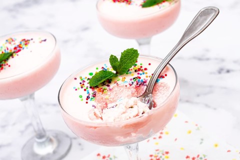 Fruit mousse, made from jelly and cottage cheese, in glasses, decorated with sprinkles and mint,