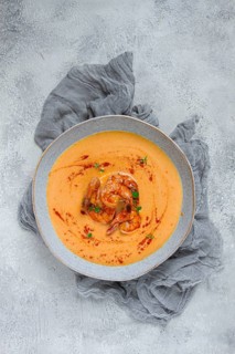 Pumpkin cream soup with shrimp, herbs and spices, homemade, no people