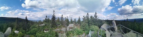 Panorama from Nusshardt over wooded area with views of rocks and sky, Franconian mountain trail,