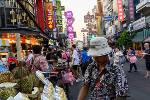 Bangkok, Thailand. February 18th 2025. Popular street food stalls along a crowded Yaowarat Road,
