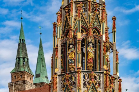 The Beautiful Fountain on the Main Market Square and the Towers of St. Sebaldus Church, Nuremberg,