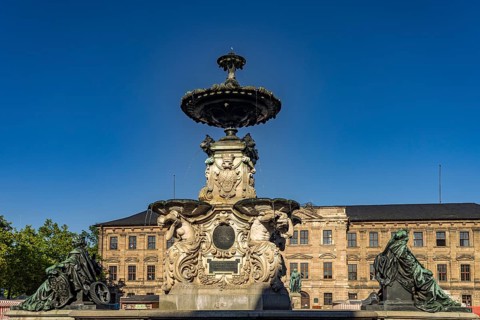 The Paulibrunnen on the market square and the castle in Erlangen, Middle Franconia, Bavaria,