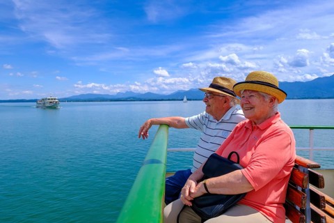 Seniors on a boat trip on the Chiemsee, Chiemgau, Upper Bavaria, Bavaria, Germany