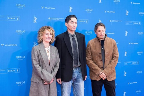 Tricia Tuttle, Hang Chong and Sean Baker in front of the premiere of the film Everything Everywhere