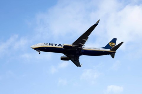 Boeing 737 commercial passenger airliner jet aircraft of Ryanair airways in flight on approach to