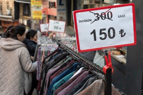 Istanbul, Turkey 7th January 2025. Local shoppers browsing clothes reduced in price in a popular