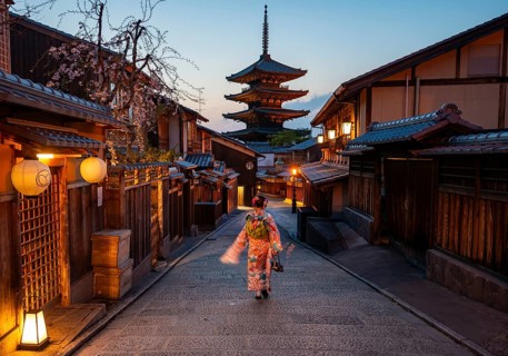 Japanese woman wearing kimono in an alley, Yasaka dori historic alleyway in the old town with